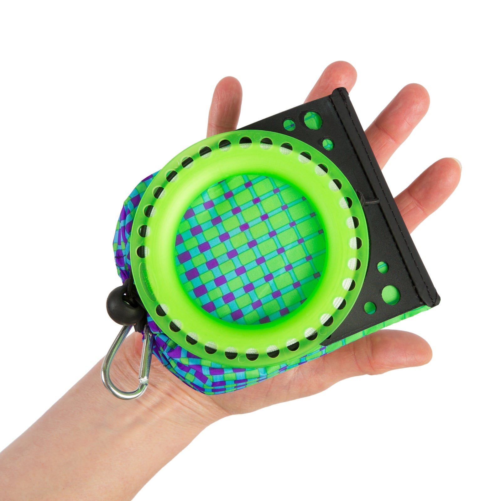 Example of packaged size vs adult hand with winder showing