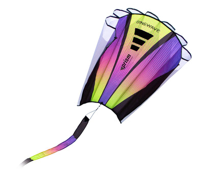 A yellow pink and purple frameless kite over a white background