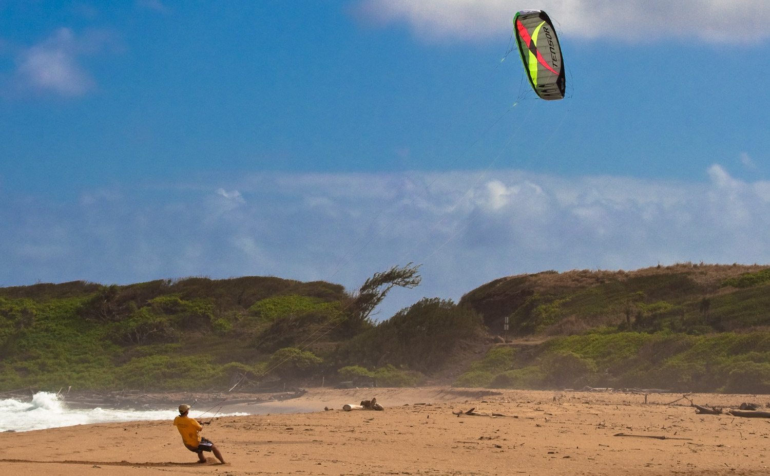 Man flying Tensor power kite on the beach